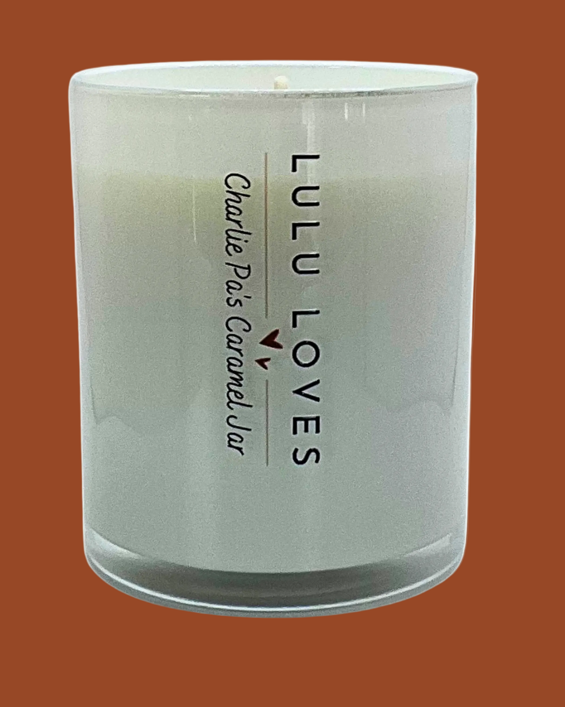 Charlie Pa's Caramel Jar Candle on Caramel coloured background